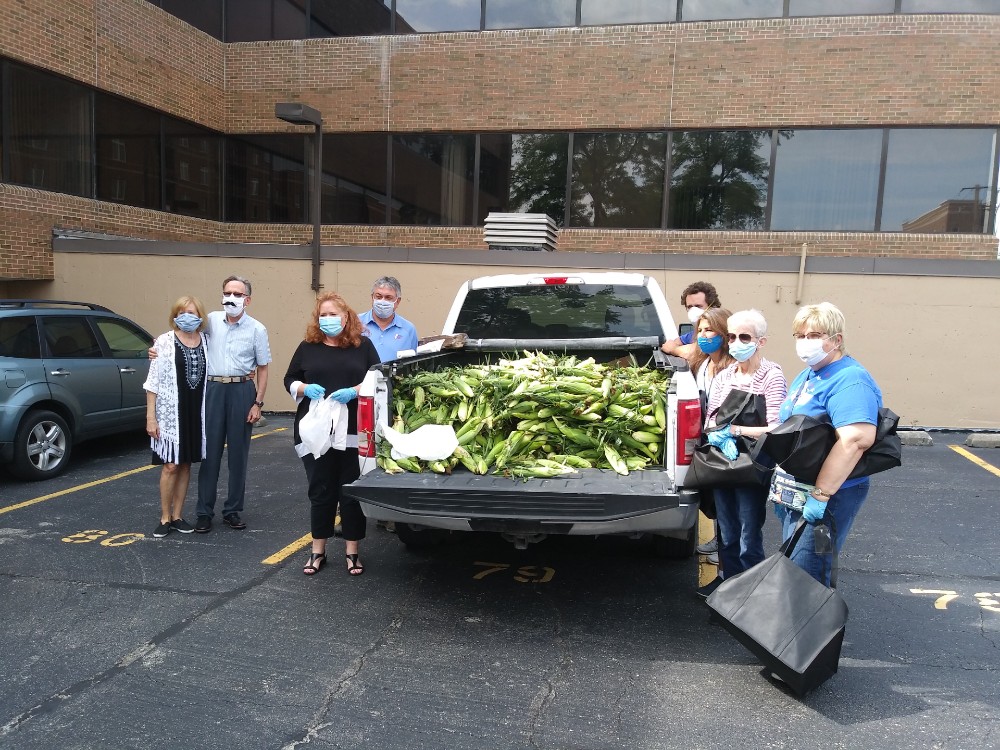 Local food pantries receive hand picked sweet corn at Murphy giveaway SMALLER